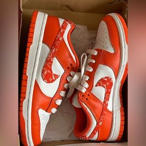 Nike dunks orange and white